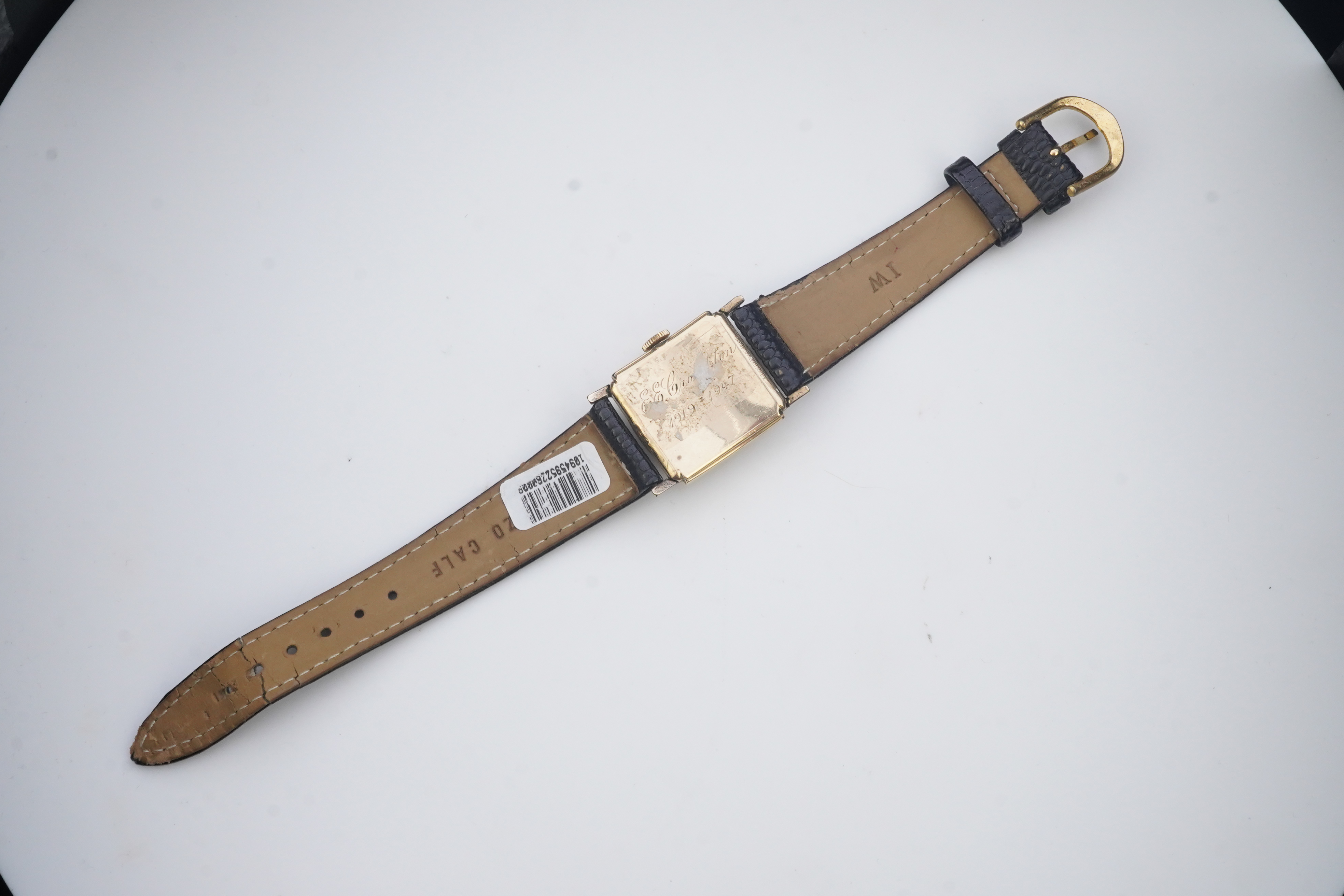 A gentleman's late 1940's gold plated Longines manual wind wrist watch, on a later associated leather strap